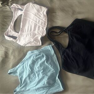 Set of four Sports Bras - Black(2), White, and Light Blue